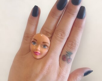 Upcycled Barbie doll head doll parts ring