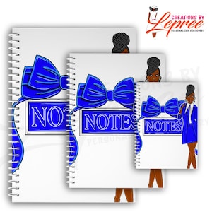 May include: White spiral-bound notebooks with a blue bow design and the word "NOTES" in a blue rectangle. The notebooks are in different sizes. The image also includes a cartoon illustration of a woman in a blue suit.