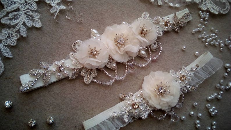 Wedding ivory garter set with flowers and crystals