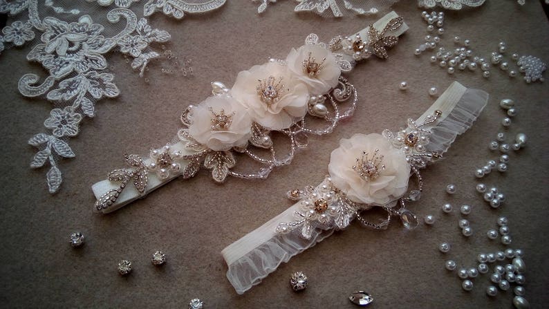 Wedding ivory garter set with flowers and crystals