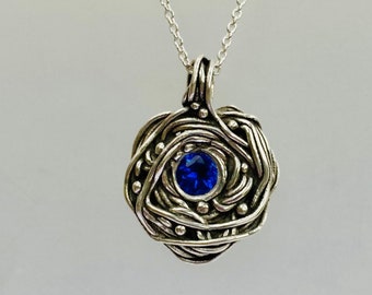 Handmade Fine Silver Nest Pendant with lab sapphire gemstone. Dainty necklace