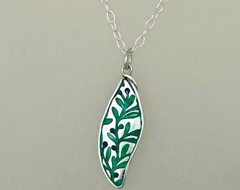 Handmade Silver leaf shaped pendant with enamel in blue and green tones.