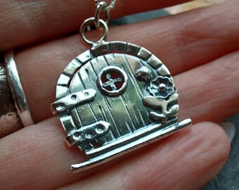 Sterling silver fairy door hobbit necklace with flower and window detail