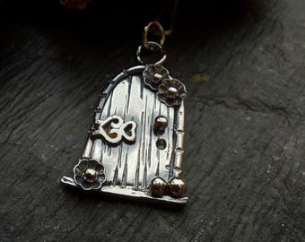 Sterling silver fairy door hobbit necklace with little flowers