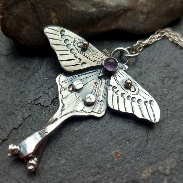 Silver Luna Moth with layered wings and amethyst