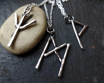 Silver rune charm necklace with hammered finish , chunky rune pendant , letter necklace
