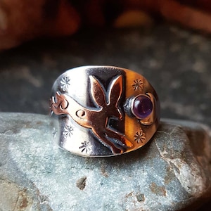 Silver moon and copper hare ring with amethyst  , leaping hare saddle ring with crescent moon and stars