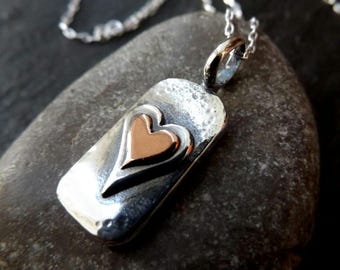 Silver chunky heart necklace , with copper and textured, hammered finish