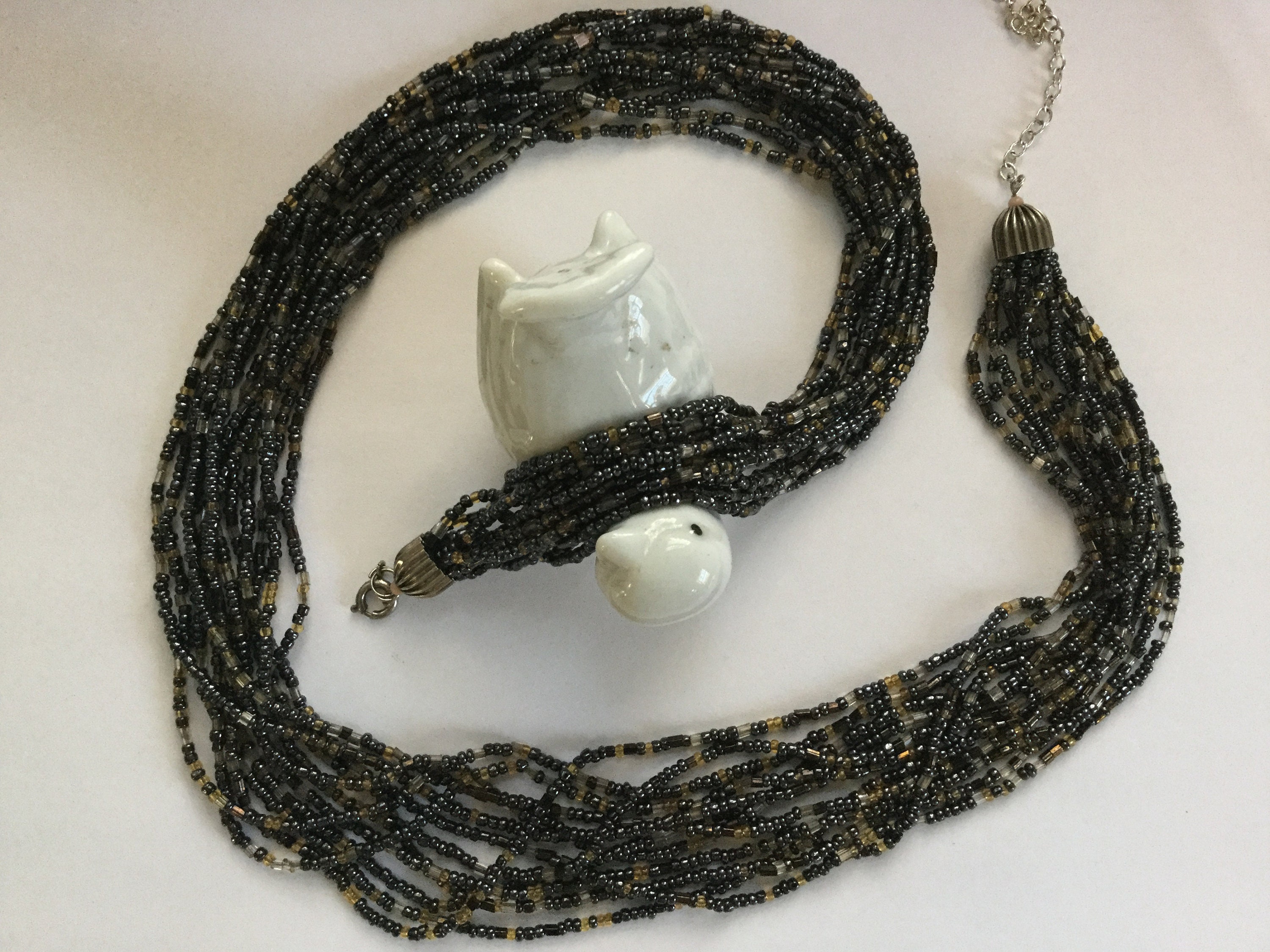 Multistrand brown, black, and blue beaded necklace — Family Tree Resale 1