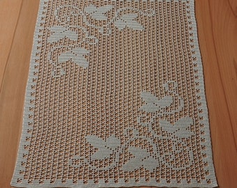 Table cover with leaves motif