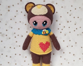 Hand crocheted doll in bear suit