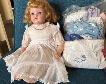 22 Inch Madame Alexander Baby Genius Doll with Wardrobe