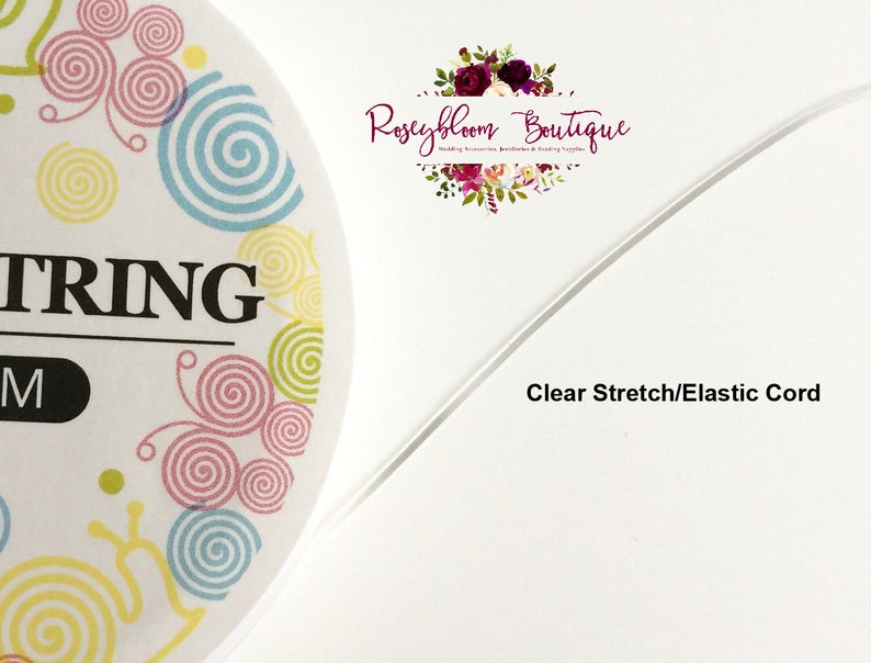 May include: Clear stretch elastic cord, also known as string, for crafts and jewelry making. The cord is white and is shown on a white background.