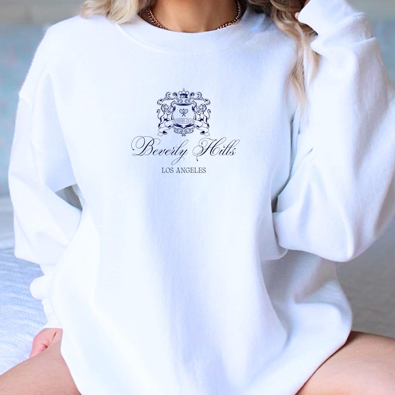 Beverly Hills Tennis Club Sweatshirt with old money lions crest.