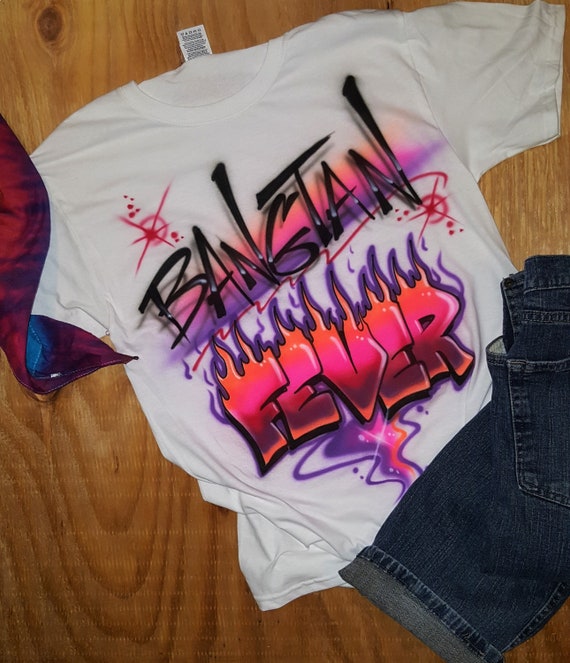 Custom black t- shirt with fabric spray paint