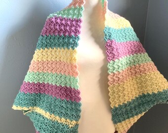 The Cloud-Drift Cocoon Wrap Handmade Crocheted Sweater in Pastel Stripes. Cozy but lightweight wrap.