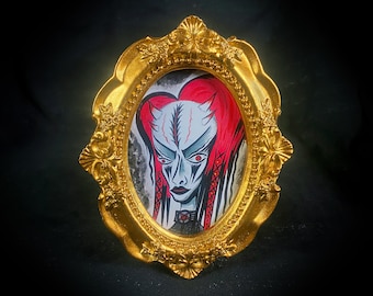 Scar Head Tiny Demon Framed Print