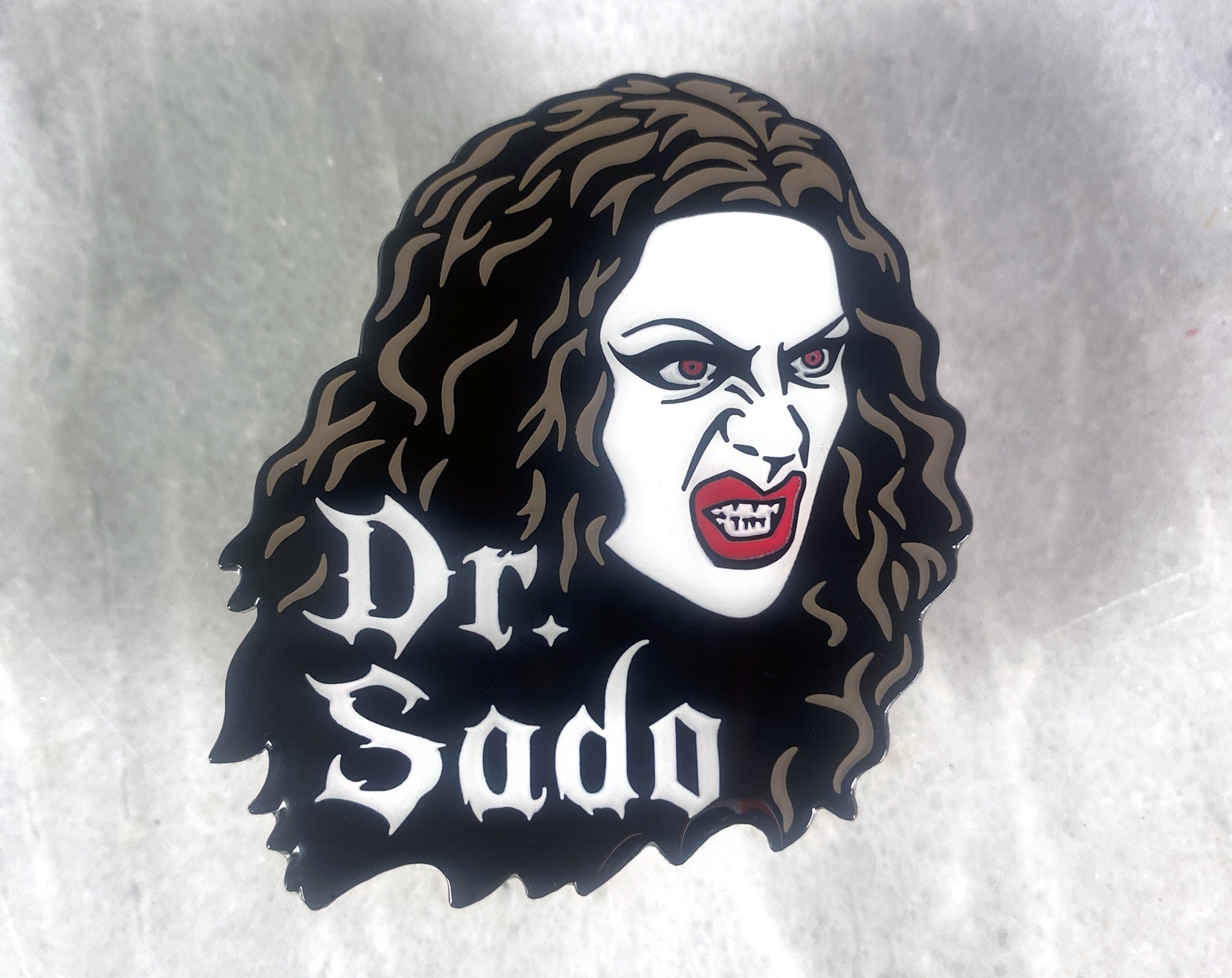 Dr Sado Enamel Pin