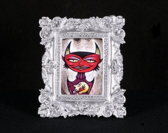 Head Holder Tiny Demon Framed Print