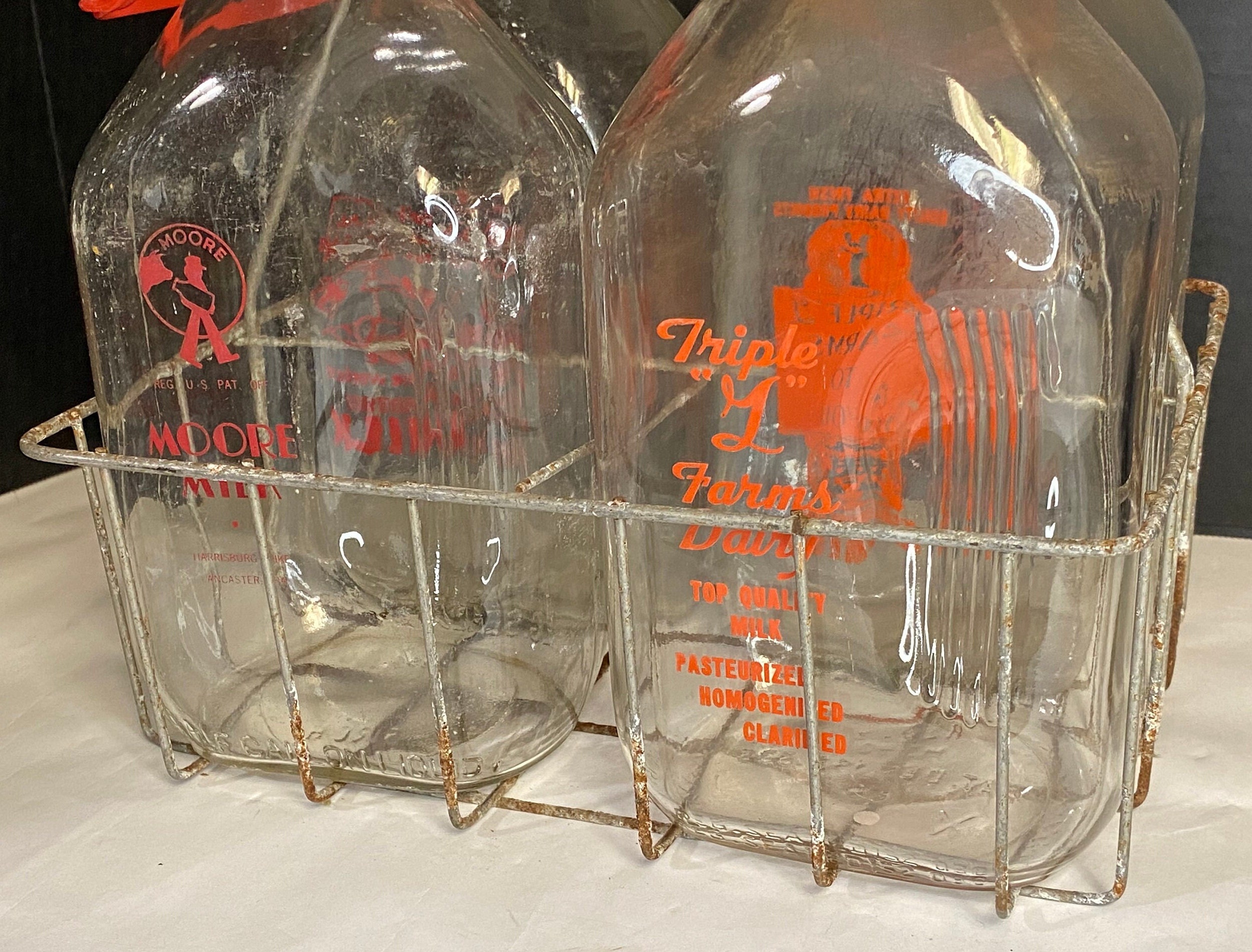 Vintage Glass Milk Bottles in a Wire Carrier - Organized Clutter