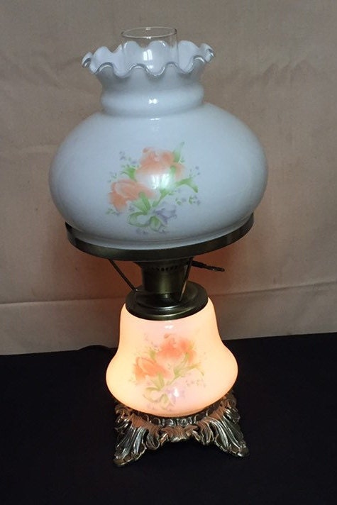 A Painted Peach and Purple Floral Electric Hurricane Table ...