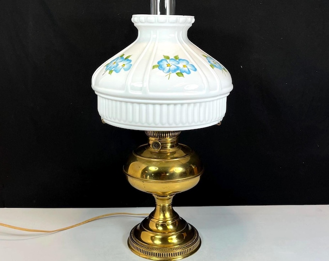 Featured listing image: 1970s Brass Tone Hurricane Table Lamp: Aladdin Blue Dogwood Floral Shade
