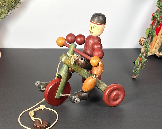 Featured listing image: Louis Nichole Wood Bead Boy on Tricycle, Pull Toy, 1983
