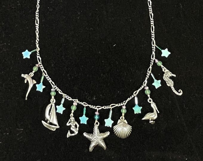 Featured listing image: Sterling Silver Charm Necklace by Lucy Isaacs, NYC, Sea Charms and Turquoise Stars