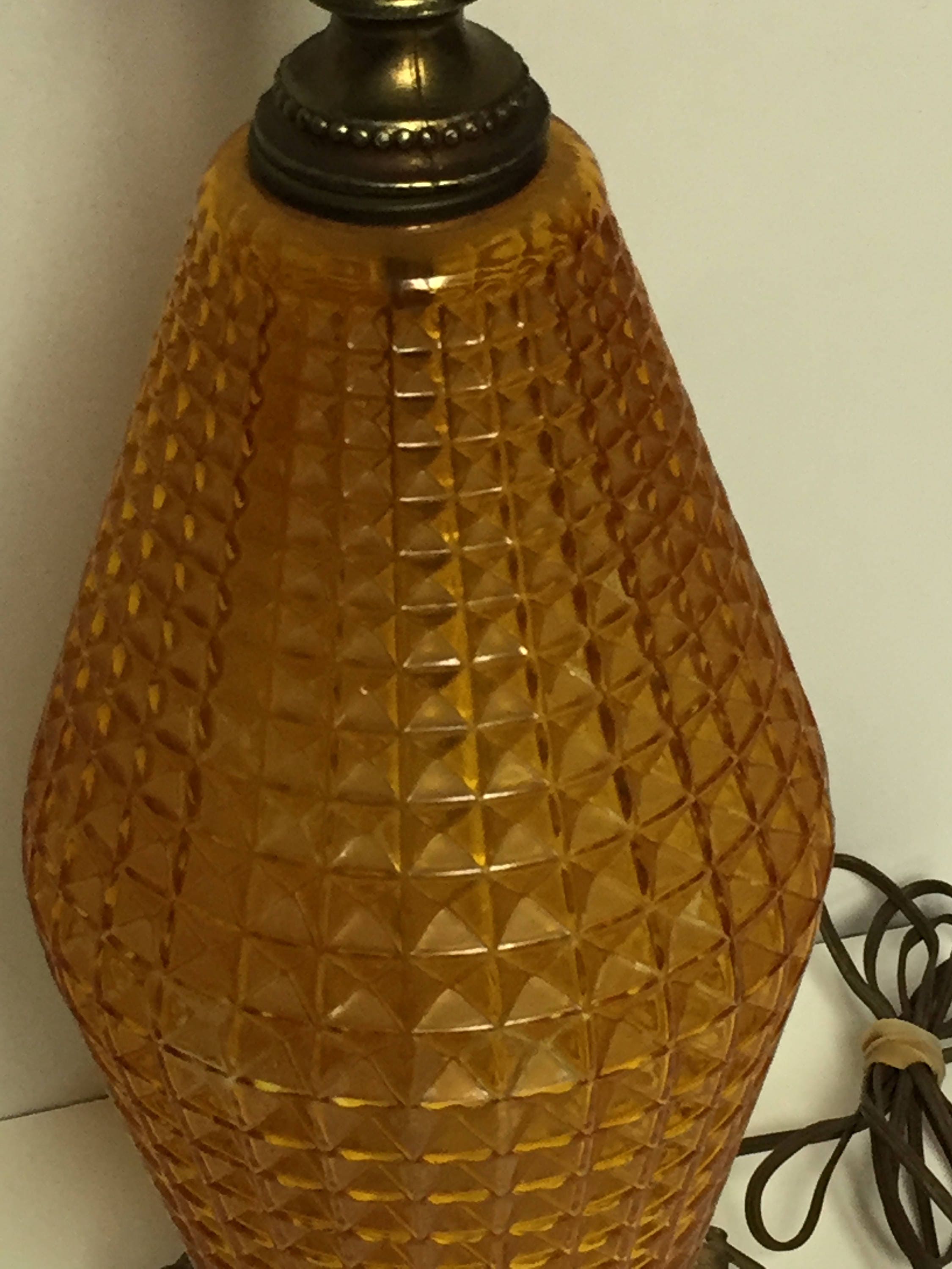 Mid Century Hollywood Regency Diamond Cut Amber Glass Table Lamp with a