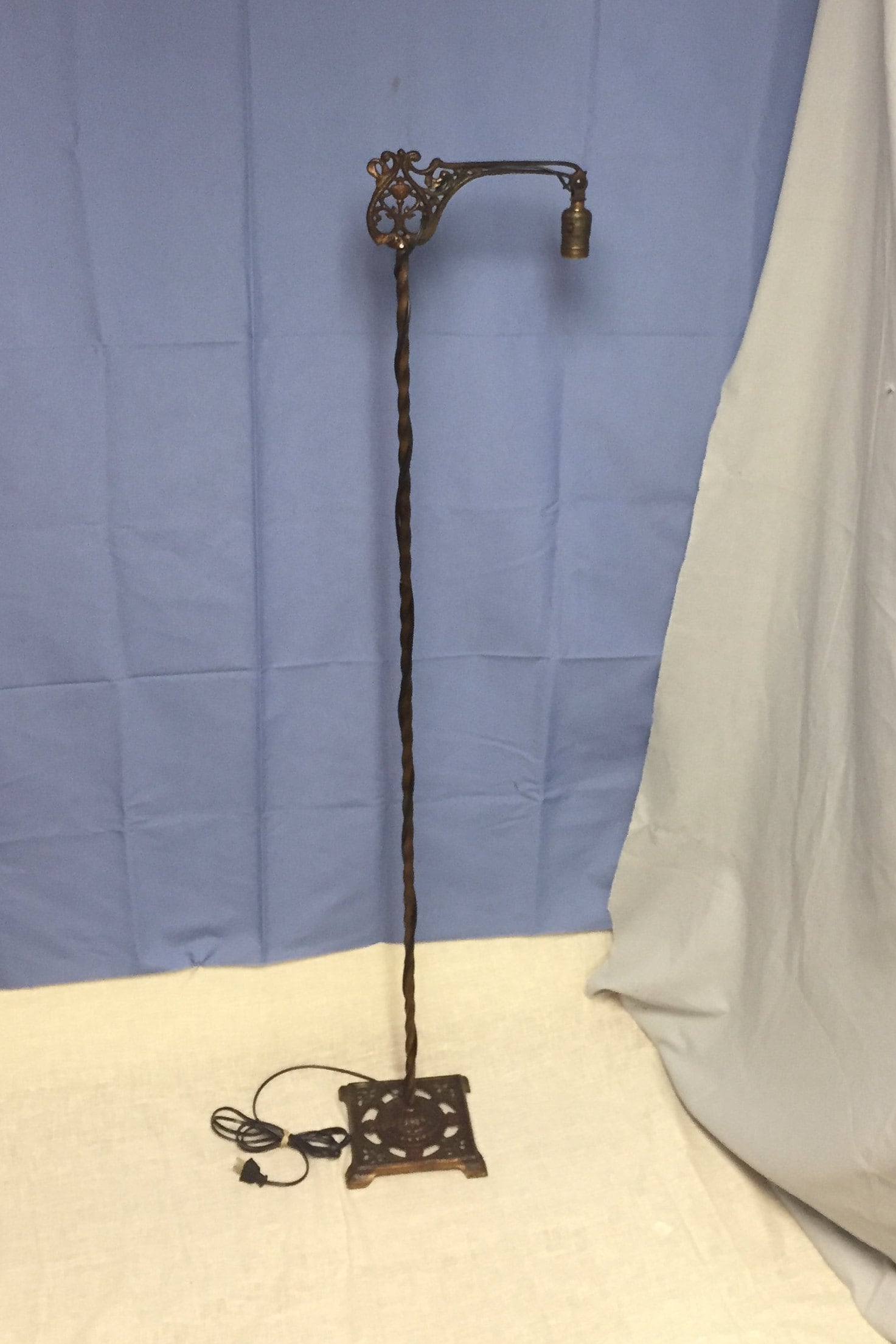 An Ornate Hand Painted 1930's Cast Iron Bridge Arm Floor Lamp with a