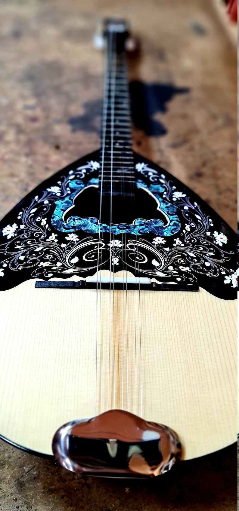 A wonderful 8 string bouzouki, suitable for students and beginners, made by hand with all solid materials