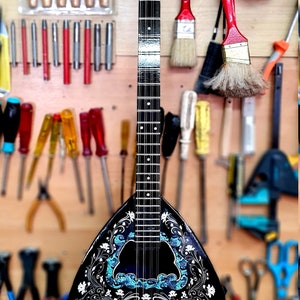 A wonderful 8 string bouzouki, suitable for students and beginners, made by hand with all solid materials
