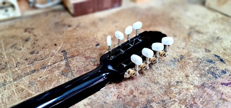 A wonderful 8 string bouzouki, suitable for students and beginners, made by hand with all solid materials