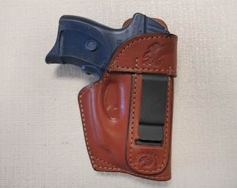 Ruger Lc9 with red Ct laser Iwb BROWN leather holster with shield right hand