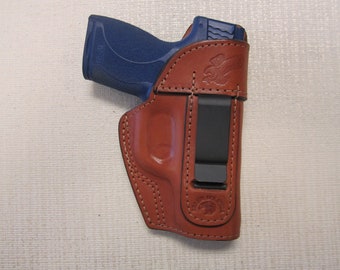 Smith and Wesson - M&P shield 3.3 45 cal., iwb formed BROWN leather holster, right hand with sweat shield