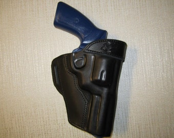 RUGER GP100 357 magnum with 4.2" BARREL, leather owb, belt slot holster