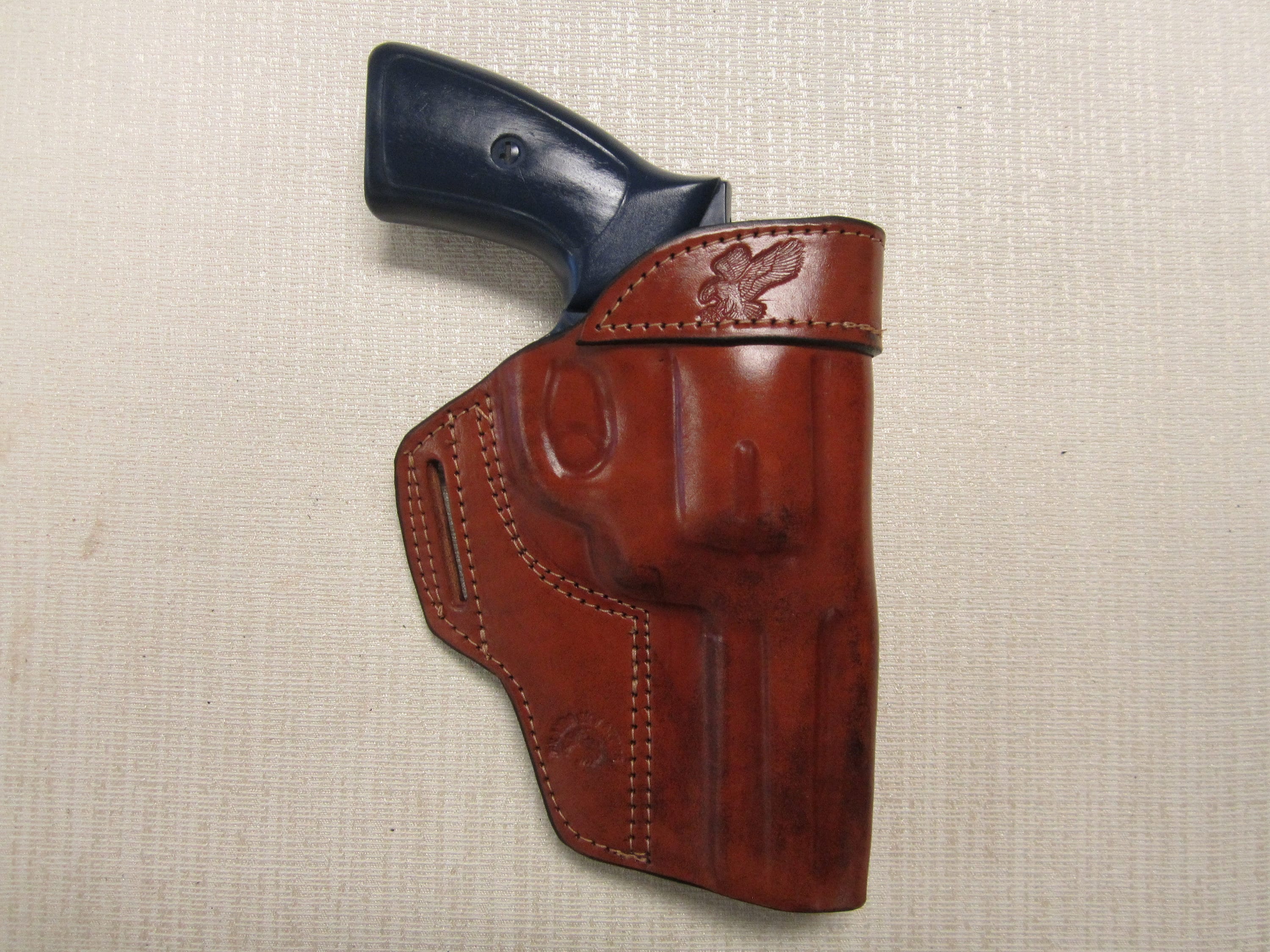 RUGER GP100 357 magnum with 4.2" BARREL, formed BROWN leather owb, belt slot holster