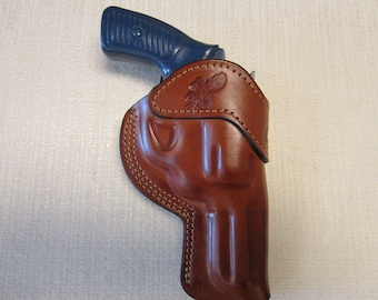 RUGER SP101 357 mag, with 3" barrel, formed BROWN leather owb, belt holster right hand