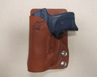 Braids Holsters, Ruger lc9 with crimson trace trigger guard laser formed Brown leather right hand, wallet & pocket holster