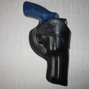 RUGER SP101 357 mag, with 3&quot; barrel, formed leather owb, belt holster