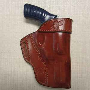 RUGER SP101 357 mag, with 3&quot; barrel, formed BROWN leather owb, belt slot holster