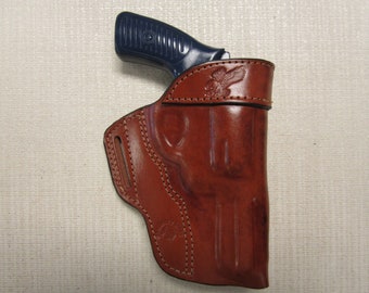 RUGER SP101 357 mag, with 3" barrel, formed BROWN leather owb, belt slot holster