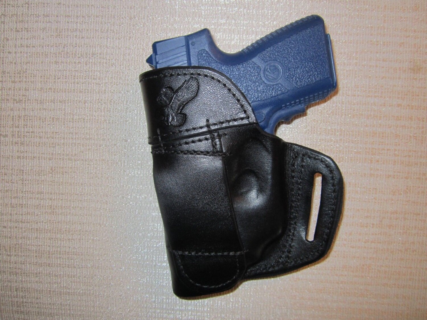 KAHR PM9 & CM9 WITH CRIMSON TRACE lase leather R H wallet or pocket holster 