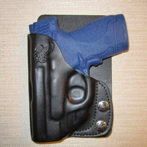 Braids Holsters, Smith and Wesson M & P shield 9 mm and 40 cal.. with Crimsontrace laserguard right hand wallet and pocket holster