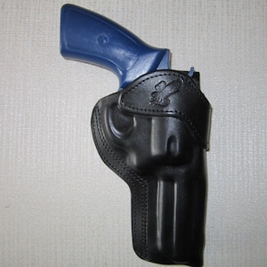 RUGER GP100 357 magnum with 4.2&quot; barrel, formed leather RIGHT HAND belt holster