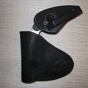 NAA mini revolver,22 short,22 long rifle & 22 magnum, leather pocket holster