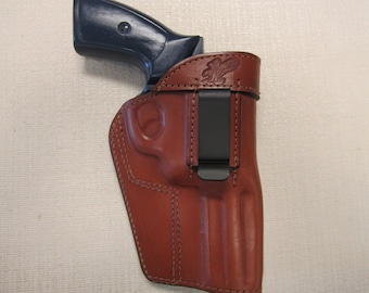 Ruger Gp 100 357 magnum with 4.2" barrel, formed Brown leather IWB RIGHT HAND  holster