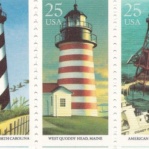 May include: Five different United States postage stamps featuring lighthouses. Each stamp depicts a lighthouse with a red, white, and black color scheme. The stamps are labeled with the lighthouse location and "25 USA".
