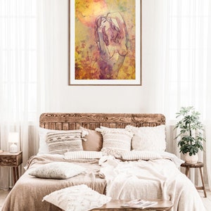 May include: A framed watercolour painting of a nude woman with long, flowing hair, standing in a field of flowers. The background is a soft yellow with hints of pink and purple.