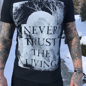 Never Trust The Living